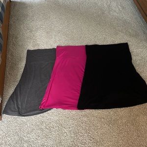 A line skirts— 3 colors. Black, Grey & Fuchsia. Great as a quick beach cover up.